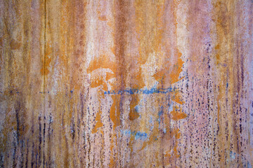 rusty iron sheets with paint spots, selective focus