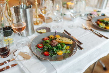 Delicious dinner beautifully arranged on a dinner plate.