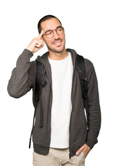 Happy student doing a gesture of concentration