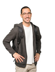 Happy student posing against background