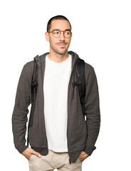 Fototapeta premium Hesitant student looking up gesture