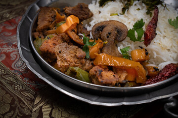 Seitan curry with mushroom, peppers, rice, lentil stew, copy space