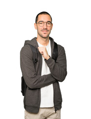 Satisfied student with crossed arms gesture