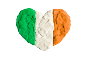 Green, white and red orange flag of Ireland, Irish flag. Heart shape of tricolour flag plasticine modeling clay isolated on white background. Plasticine finger textured background. Closeup