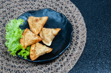 Fried pastry a black  background