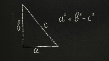 Pythagorean theorem on a chalkboard. Handwritten letter
