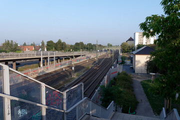 Traffic, railroad tracks and expressway running in parallel