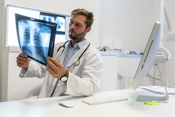 pulmonologist Doctor looks at a chest x-ray - clinic medical concept