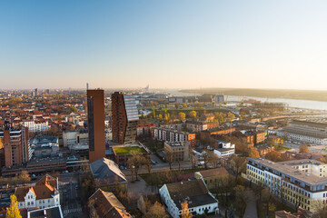 Scenic aerial view of the Old town of Klaipeda, Lithuania in golden evening light. Klaipeda city port area and it's surroundings on autumn day.