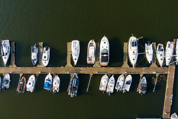Aerial view of beautiful yachts by the pier in the yacht club in Klaipeda, Lithuania.