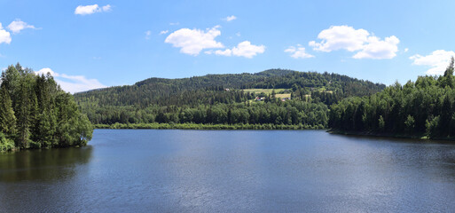 Beskid Mountains scenery on the dam of river Slawa  in Poland