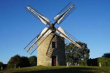Fototapeta na wymiar old stone windmill in the countryside in brittany france