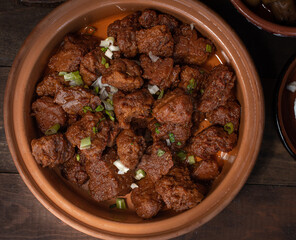 Fried seitan in clay pot