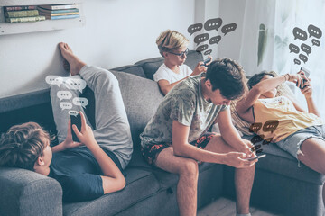 Teenagers send messages using smartphone sitting at home. Teen chatting online Communication concept