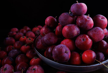 Full plate of fresh red apples. Lots of ripe apples.