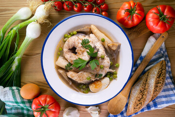 Conger eel with white asparagus and egg. Traditional Spanish tapas from a fishing village.