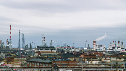 View of the oil refinery.  Production equipment at a petrochemical plant. Oil refining production....