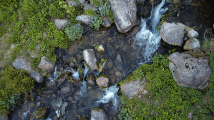 Top view on a river stream. Rocky river