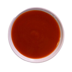 Sriracha, chili sauce on white plate. isolated on white background, top view.
