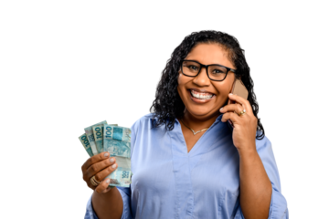 woman holding money talks on cell phone and smiles contentedly