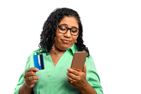 woman holds debit card and speaks cell phone with dismayed, sad expression