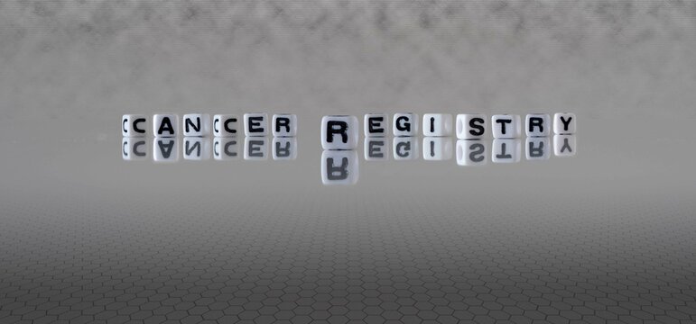 cancer registry word or concept represented by black and white letter cubes on a grey horizon background stretching to infinity