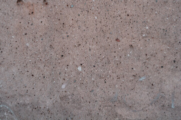 Old decorative concrete pavement, grungy vintage background closeup, grunge texture.