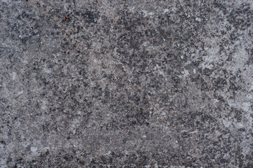 Old antique concrete pavement, grungy vintage background closeup, grunge texture.