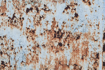 old rusty sheet of metal with peeling faded paint, covered with dust and dirt, grungy texture...