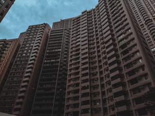 Fototapeta na wymiar Low angle view of buildings in city against sky