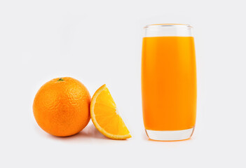 fresh orange and orange juice in glass on white background
