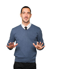 Friendly young man doing a gesture of keep calm