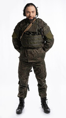 soldier in the studio on a white background. a man in military uniform with a rifle or machine gun. military or airball player