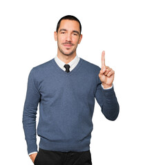 Young man making a number one gesture