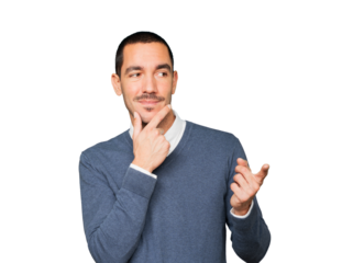 Hesitant young man pointing at you with his finger