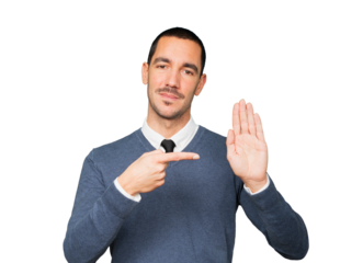 Happy young man making a gesture of stop with his palm