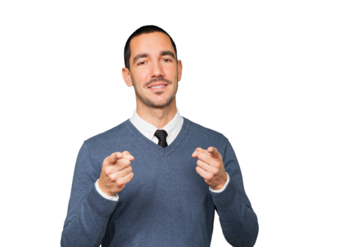 Happy young man pointing at you with his finger