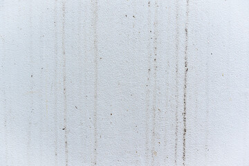 White concrete wall texture background with straight line of raindrop pattern, dirty stain on cement wall