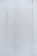 White concrete wall texture background with straight line of raindrop pattern, dirty stain on cement wall