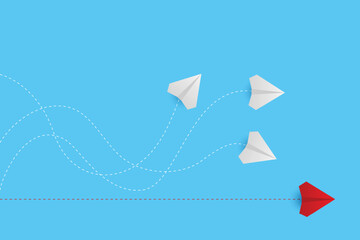 Creative paper planes on blue background. Think differently concept. Red airplane changing direction. New idea, change, trend, courage, creative solution, innovation and unique concept.