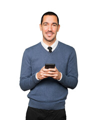 Happy young man using his mobile phone