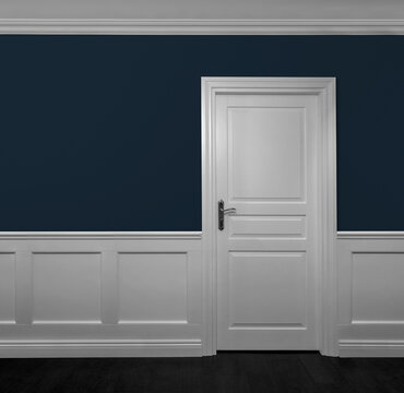 Elegant wooden door in empty room with copy space