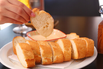 roasted bread with garlic aioli sauce closeup photo on table background