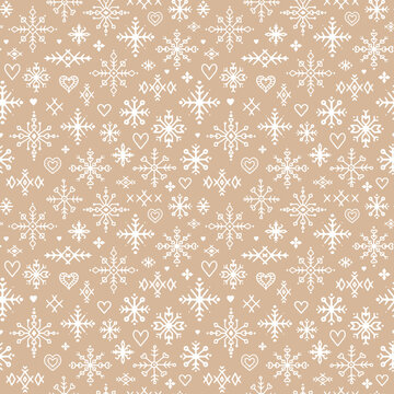 Fototapeta Natural beige snowflake seamless vector pattern. Background with white festive Snowflakes and Scandinavian ornaments.