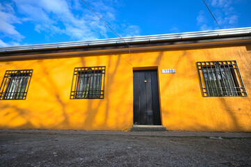 Facade of colorful adobe house in a village in south America, Talca, Chile