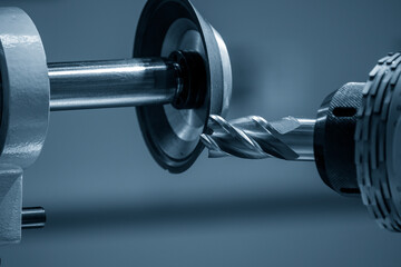 The flat end mill tool regrinding process on regrinding machine.