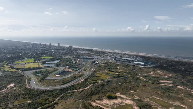 Aerial hyperlapse of the Zandvoort race track situated in the dune landscape 