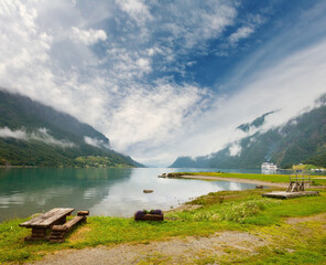 Summer cloudy Lustrafjorden fjord