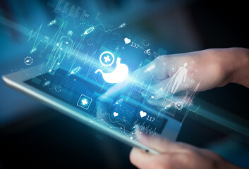 Close-up of a touchscreen with healthcare icons