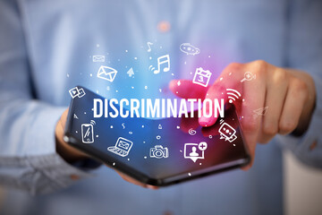 Businessman holding a foldable smartphone, social media concept